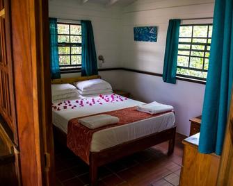 Bayaleau Point Cottages - Carriacou - Camera da letto