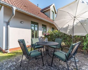 Ferienhaussiedlung Strandperlen Küstenhof 1a (Typ IV) - Wustrow (Darss) - Innenhof