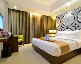 Howard Johnson by Wyndham Pekalongan Indonesia - Pekalongan - Bedroom