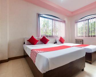 OYO 426 Coco Grove Tourist Inn - Thành phố Panglao - Phòng ngủ