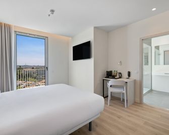 بي آند بي هوتول بورتو سنترو ماساريلوس - بورتو - غرفة نوم