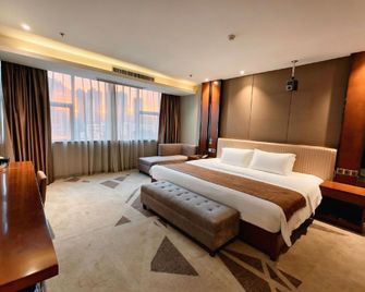 Chaoman Hotel (Foshan Lingnan Tiandi Pearl Sports Stadium Branch) - Foshan - Habitación