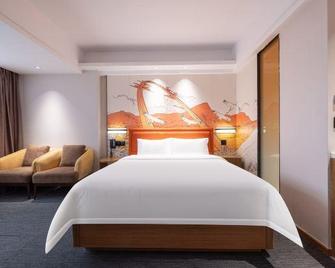 Heyi Hotel Heshan Square - Jiangmen - Bedroom