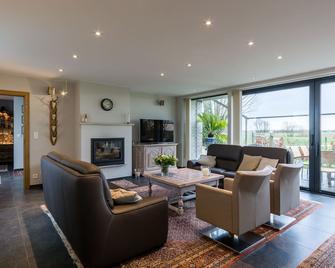 Polderwoning Cleylantshof max. 8 p midden in de polders van het Meetjesland. - Sint-Laureins - Sala de estar