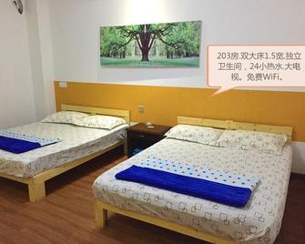 Wuzhou Youth Hostel - Wuzhou - Bedroom