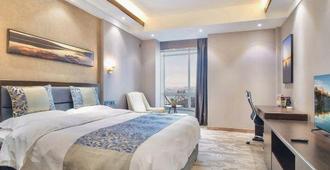 Zhonglian International Hotel - Dandong - Bedroom