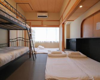 Guest House Umikaji - Naha - Bedroom