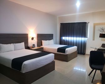 Inhouse Hotel Culiacán - Culiacán - Schlafzimmer