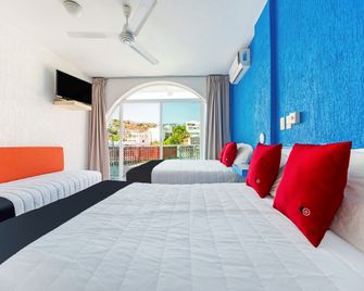 Capital O Hotel El Mejicano - Acapulco - Bedroom