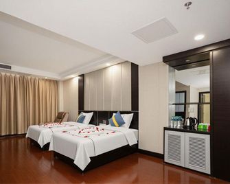 Junhong Hotel - Ji'an - Bedroom