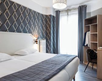فندق Ambassadeur - باريس - غرفة نوم