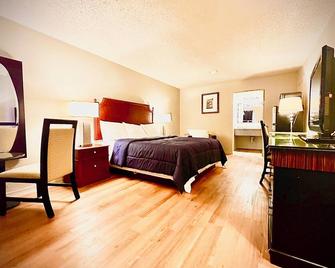 Economy Inn And Suites - Tulsa - Bedroom