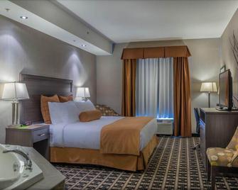 Timber Ridge Inn And Suites - Fox Creek - Schlafzimmer