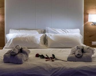Hotel Collini - Pinzolo - Bedroom