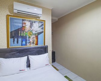 레드도어즈 @ 슬리피 자야 - 자카르타 - 침실