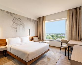 Temple Tree Hotel Shirdi - שירדי - חדר שינה