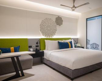Zibe Luxe Kakinada By Grt Hotels - Kakinada - Slaapkamer