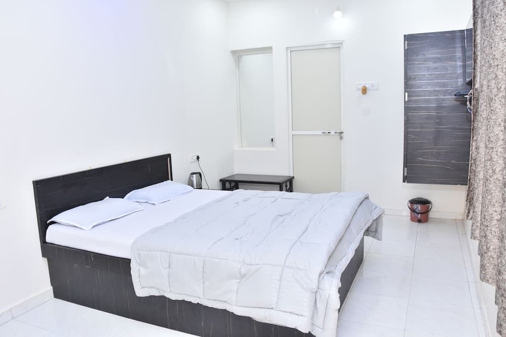 Aatithya Home Stay - אויאיין - חדר שינה