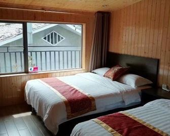 Yangshuo Baiyuan Homestay (Yangshuo West Street) - Guilin - Bedroom