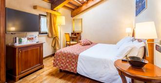 Best Western PLUS Hotel Le Rondini - San Francesco al Campo - Schlafzimmer