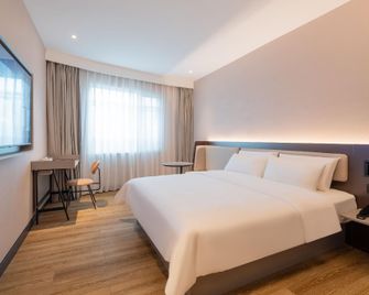 Hanting Hotel Jiaozhou Jiaodong International Airport - Qingdao - Habitación