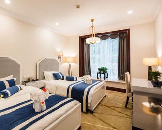 Leshan Jinhaitang Hotel - Leshan - Habitación