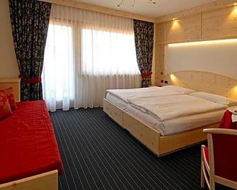 Hotel Flora Alpina - Campitello di Fassa - Habitación