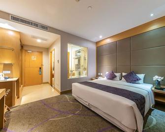 Dorsett Wuhan - Wuhan - Makuuhuone