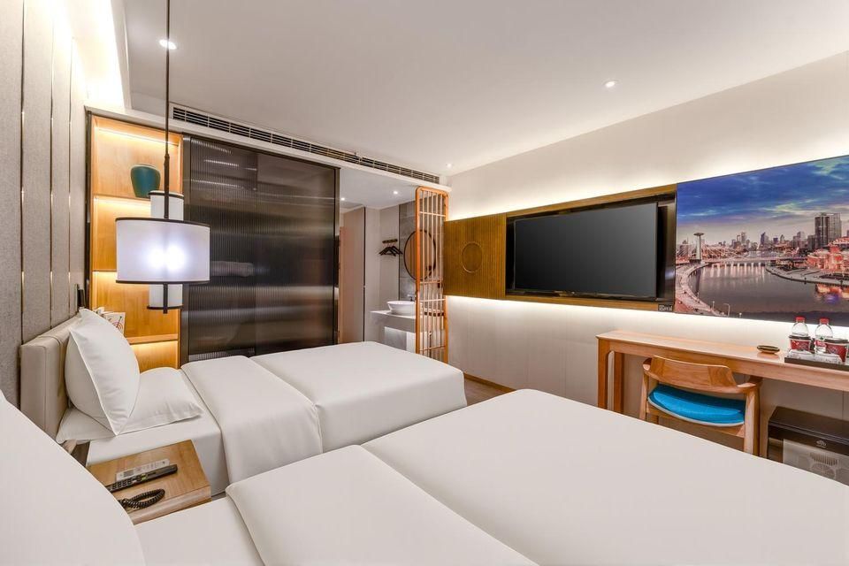Xingnuo Hotel (Tianjin Xiao Bai Lou Five Avenue) - تيانجين - غرفة نوم