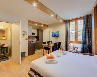 Studio Les Caribous Mountain Retreat - Happy Rentals - Pragelato - Camera da letto