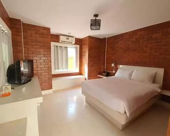 تشانجسوفا هوتل - رايونغ - غرفة نوم