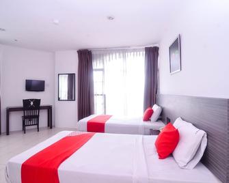 Mendu Inn - Kuching - Bedroom