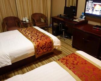 Guangdian Hotel - Nanyang - Schlafzimmer