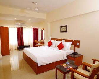 Iswarya Residency - Kottayam - Habitación