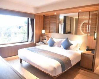 Qi Ming Xing Hot Spring Hotel - Mian Yang - Chambre