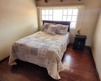 Cozy loft with WiFi and backup generator - Cuenca - Bedroom