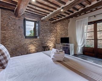 Borgo San Quirico d'Orcia B&B - Capitano Collection - Albergo diffuso - San Quirico d'Orcia - Habitación