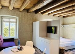 Albola Suite Holiday Apartments - Riva del Garda - Makuuhuone