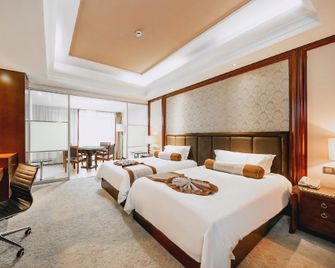 Baihui Hotel - Huzhou - Bedroom