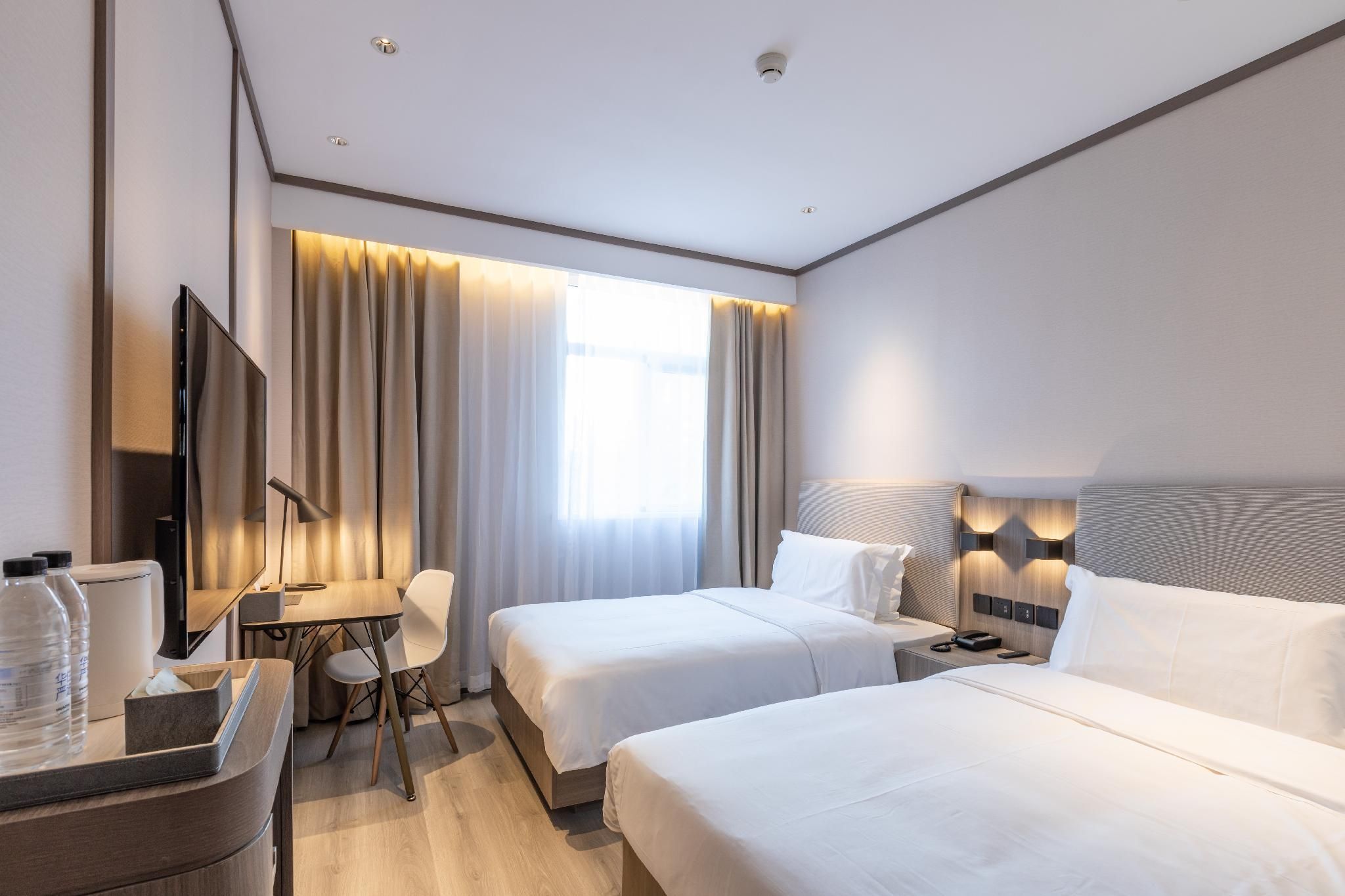 Hanting Hotel Tianjin Yibindao Metro Station - تيانجين - غرفة نوم