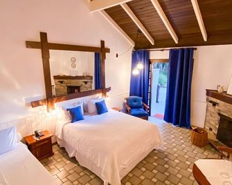Pousada O Cantinho da Raposa - Monte Verde - Bedroom