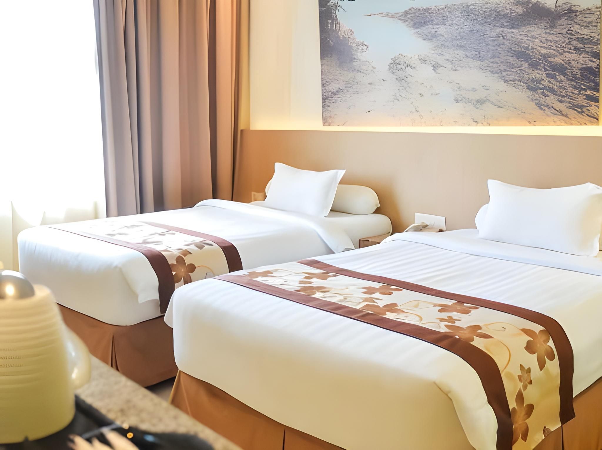 Sahid Batam Center Hotel & Convention - באטאם קוטה - חדר שינה