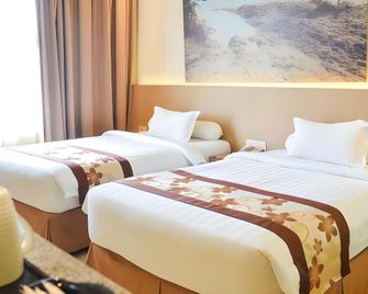 Sahid Batam Center Hotel & Convention - באטאם קוטה - חדר שינה