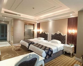 Zhonghe Hotel - Hezhou - Habitación