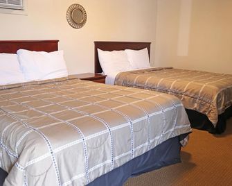 The Falls Family Lodge - ניאגרה פולס - חדר שינה