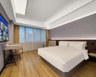 Hanting Hotel Zhuji Datang - שאושינג - חדר שינה