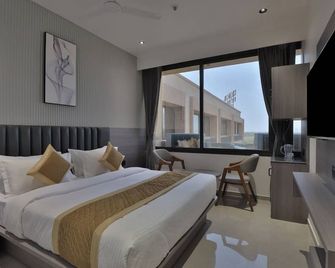 Hotel Legacy - Ahmedabad - Schlafzimmer