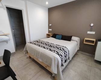 Montano Boutique Suites - אל קאלאפטה - חדר שינה
