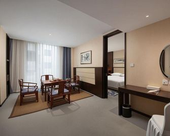 West Impression Boutique Hotel - Langfang - Schlafzimmer