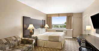 Days Inn & Suites by Wyndham North Bay Downtown - North Bay - Soverom